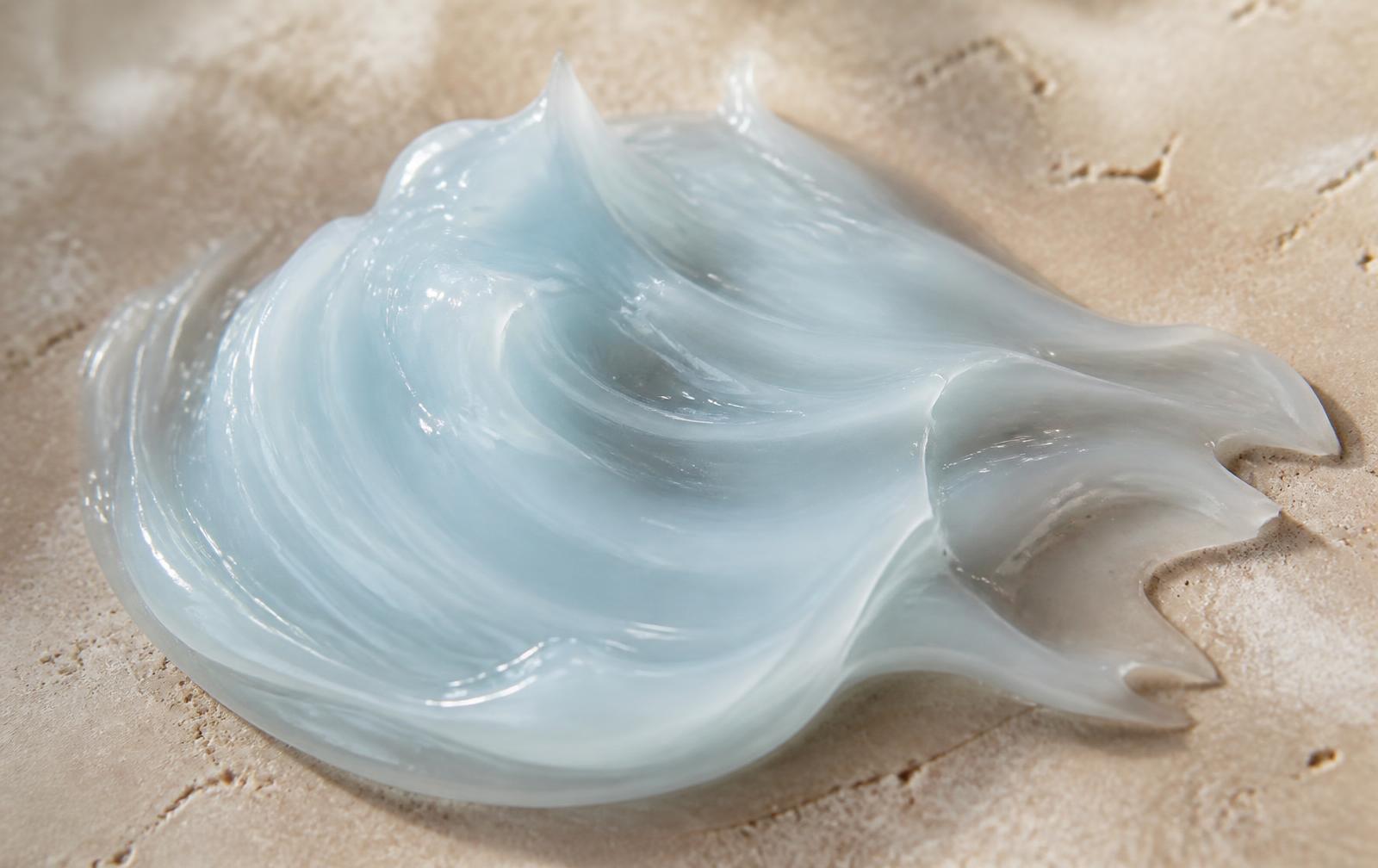 Macro texture study of a translucent peptide gel serum in soft natural light